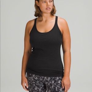 Lululemon ebb to street black tank top. Built in bra
